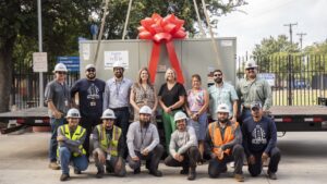 BLCCS and Haven staff with new air conditioning unit.